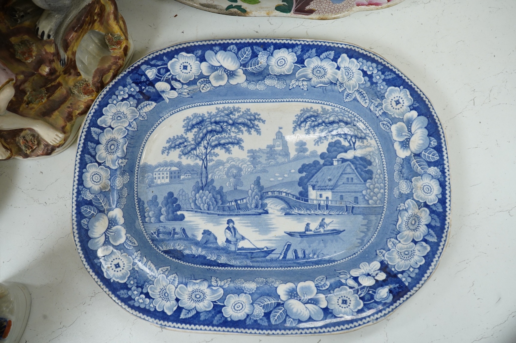 Three 19th century Staffordshire figures, including General Garibaldi, a Staffordshire pottery soup tureen and four serving plates, largest 48cm wide